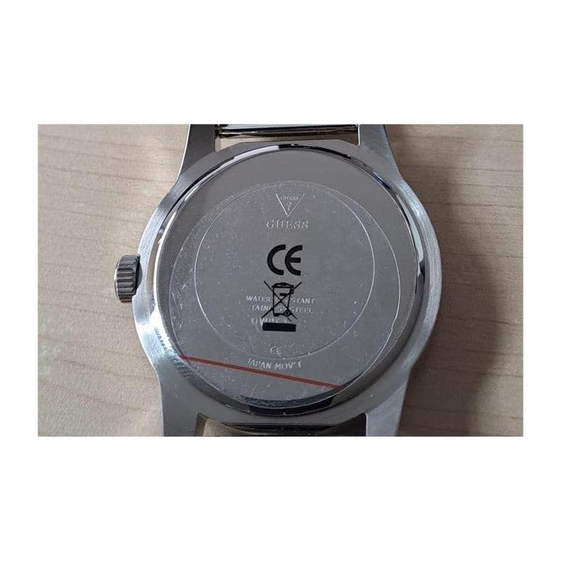GUESS, reloj pulsera para mujer con borde de moneda, multicolor, resistente al agua y diseño elegante