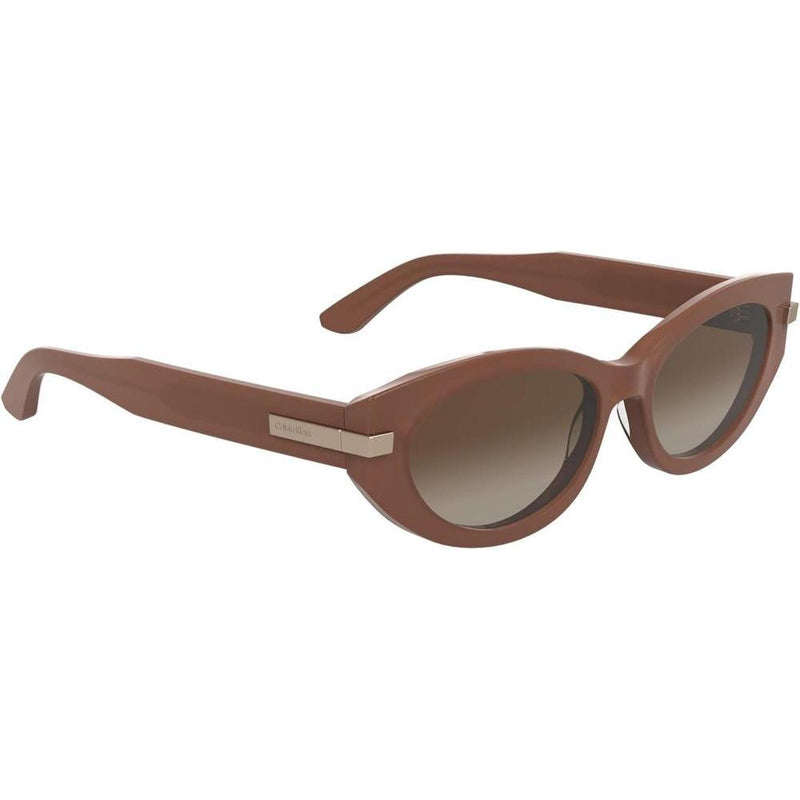 Calvin Klein Gafas de Sol para Mujer con Diseño Sofisticado, Estilo Ojo de Gato, Rosa Opalina con Lente Gradiente