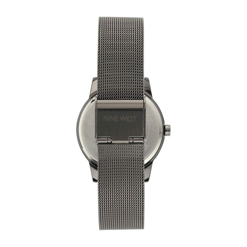 Reloj de pulsera para mujer Nine West con diseño floral, manecillas doradas, pulsera plateada, cristal resistente