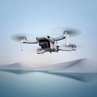 DJI Mini 4K, Drone With 4K UHD Camera, Under 249 g | 3-Axis Gimbal, 10km Video Transmission, Auto Return, Wind Resistance, 31-Min Flight Time, Intelligent Flight