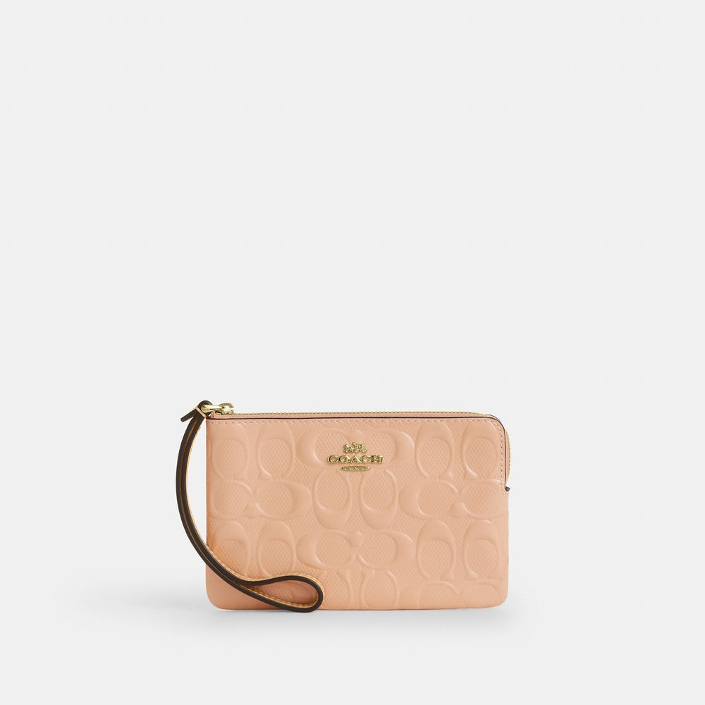 Coach corner zip wristlet in signature leather