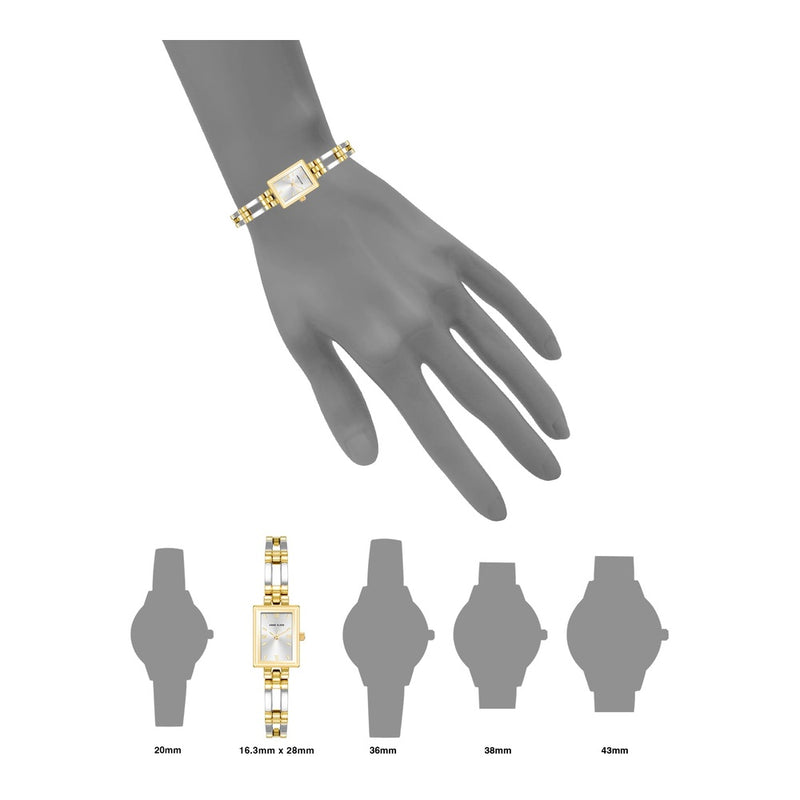 Reloj de pulsera para mujer Anne Klein con diseño bicolor, resistente al agua, esfera plateada y pulsera de metal
