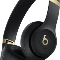 Beats Solo 4 - Negro y dorado — Audífonos inalámbricos Bluetooth on-ear, hasta 50h