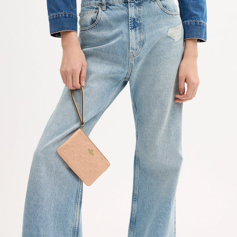 Coach corner zip wristlet in signature leather