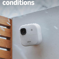 Blink Outdoor 2K+ (newest model) — Wireless smart security camera, 2K video resolution, enhanced audio, two-year battery. Sync Module Core included — 5 camera system (White)