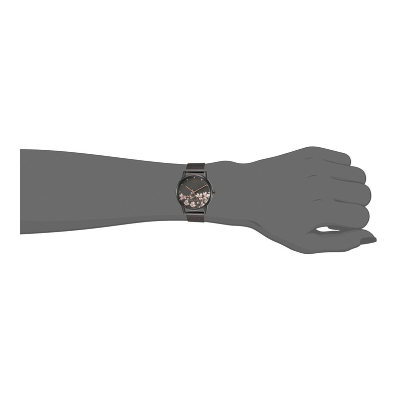 Reloj de pulsera para mujer Nine West con diseño floral, manecillas doradas, pulsera plateada, cristal resistente