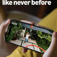 Blink Outdoor 2K+ (newest model) — Wireless smart security camera, 2K video resolution, enhanced audio, two-year battery. Sync Module Core included — 5 camera system (White)