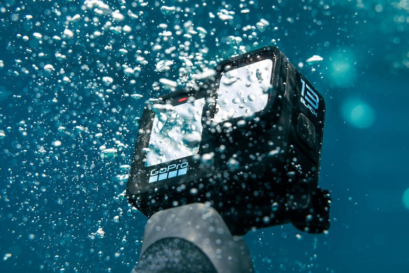 GoPro HERO13 Black Accessory Bundle - Includes The Handler, 2 Enduro Batteries, 2 Curved Adhesive Mounts, 64GB SanDisk MicroSD Card, and Carrying Case