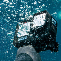 GoPro HERO13 Black Accessory Bundle - Includes The Handler, 2 Enduro Batteries, 2 Curved Adhesive Mounts, 64GB SanDisk MicroSD Card, and Carrying Case
