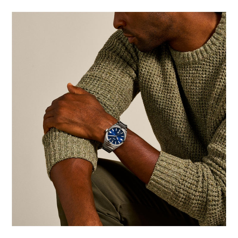 Fossil Everett - Reloj para hombre con correa de acero inoxidable o cuero, resistente al agua y esfera texturizada azul