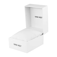 Reloj de pulsera para mujer de Nine West con movimiento de cuarzo japonés, correa de cuero sintético y esfera color champán