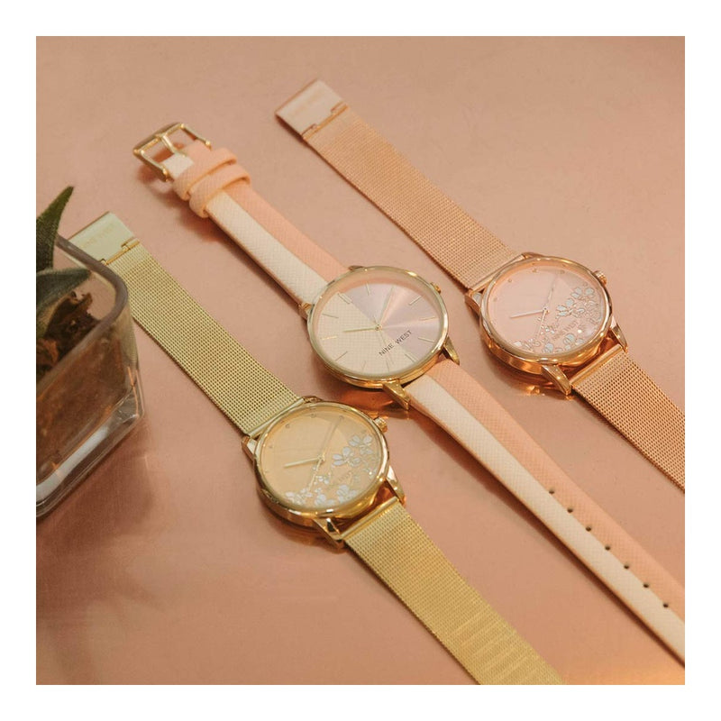 Reloj de pulsera para mujer Nine West en dorado con acero inoxidable, cristal resistente y diseño floral elegante