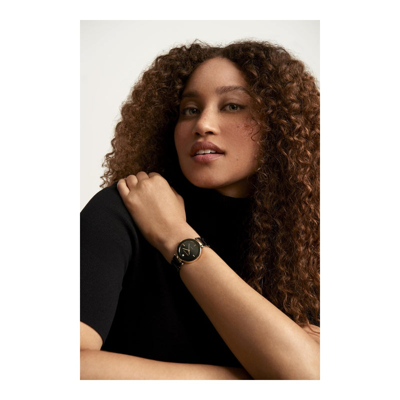 Reloj de pulsera Anne Klein para mujer con brazalete de cerámica negra y acento de diamante