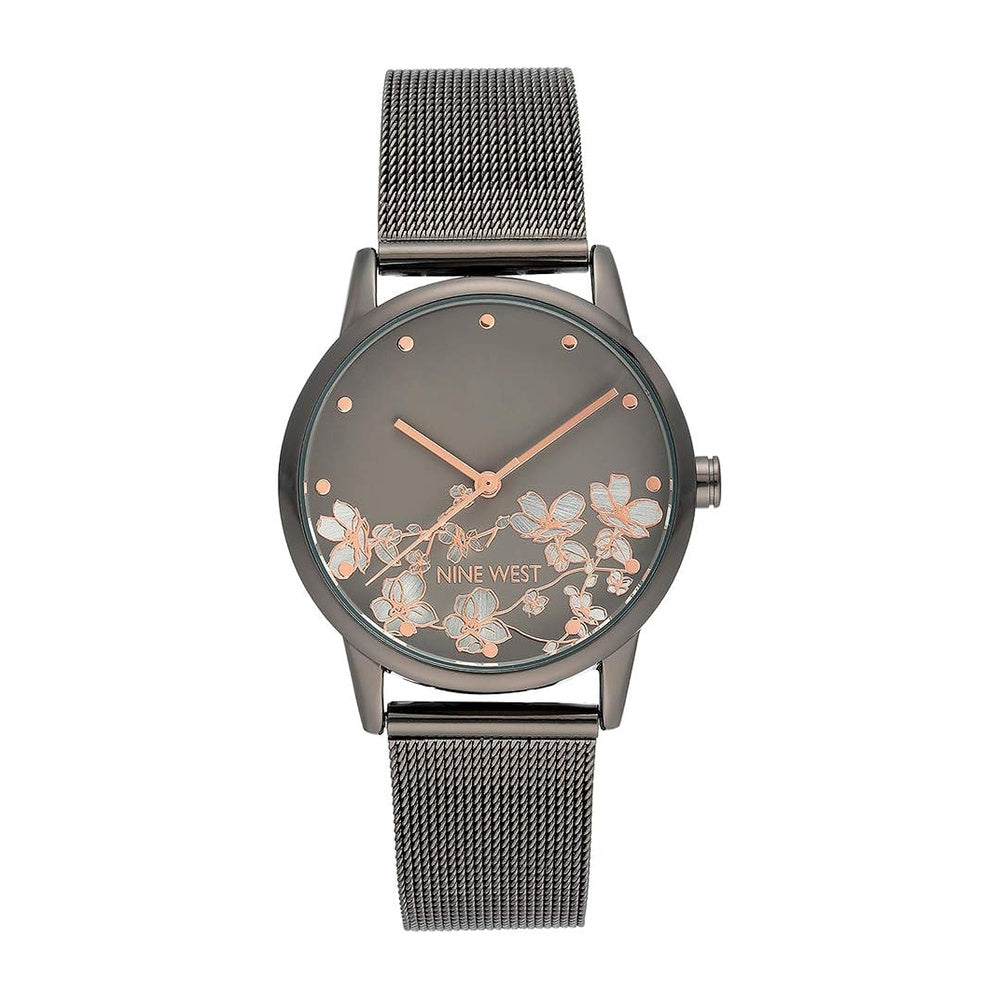 Reloj de pulsera para mujer Nine West con diseño floral, manecillas doradas, pulsera plateada, cristal resistente