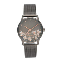 Reloj de pulsera para mujer Nine West con diseño floral, manecillas doradas, pulsera plateada, cristal resistente
