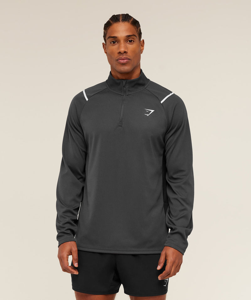 Gymshark Arrival Contrast 1/4 Zip Gris Negro - Detalle cierre