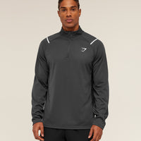 Gymshark Arrival Contrast 1/4 Zip Gris Negro - Detalle cierre