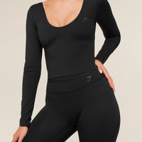 Gymshark Leggings acampanados con espalda cruzada