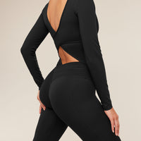 Gymshark Leggings acampanados con espalda cruzada