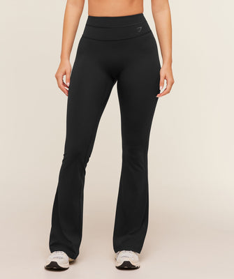 Gymshark Leggings acampanados con espalda cruzada