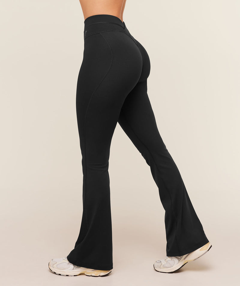 Gymshark Leggings acampanados con espalda cruzada