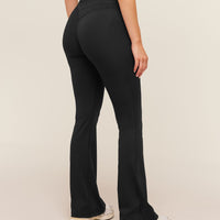 Gymshark Leggings acampanados con espalda cruzada