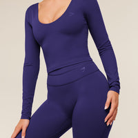 Gymshark Leggings acampanados con espalda cruzada