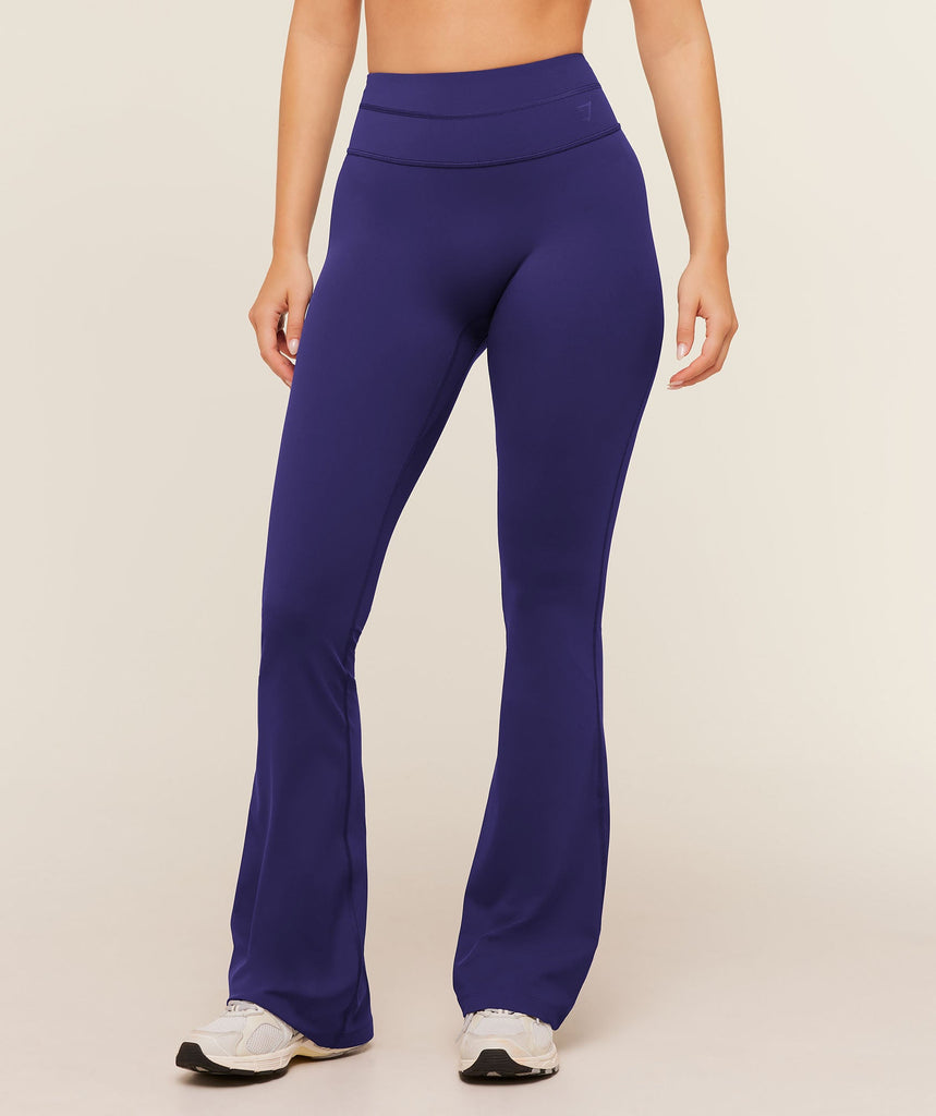 Gymshark Leggings acampanados con espalda cruzada