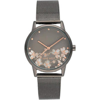 Reloj de pulsera para mujer Nine West con diseño floral, manecillas doradas, pulsera plateada, cristal resistente