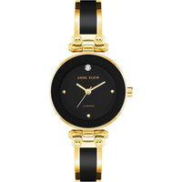 Reloj de pulsera Anne Klein con esfera de diamantes genuinos y diseño elegante en negro y dorado