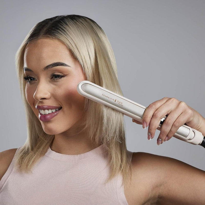 Plancha Remington Shine Therapy infundida con aceite de argán y queratina para un acabado profesional y sin encrespamientos