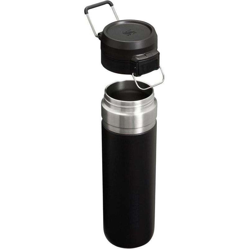 Stanley Quick Flip GO Botella de agua, tapa de botón, a prueba de fugas y plegable para viajes y deportes, acero inoxidable sin BPA, negro