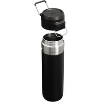 Stanley Quick Flip GO Botella de agua, tapa de botón, a prueba de fugas y plegable para viajes y deportes, acero inoxidable sin BPA, negro