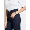 GUESS Reloj de pulsera multicadena para mujer en tono plateado con dial dorado y segundero, resistente a arañazos