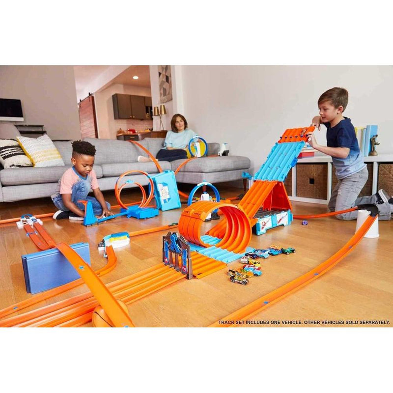 Hot Wheels Race Crate con 3 acrobacias, almacenamiento portátil para edades de 6 a 10