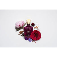 Creed Carmina, un perfume de lujo para mujer que combina fragancias florales y amaderadas, ideal para resaltar elegancia y personalidad
