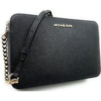 Michael Kors Bolso cruzado Jet Set para mujer con cierre superior de piel Saffiano y correa ajustable