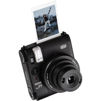 Fujifilm Instax Mini 99: Cámara instantánea con estuche, funcionalidades modernas, efectos de color y sistema de enfoque de zona