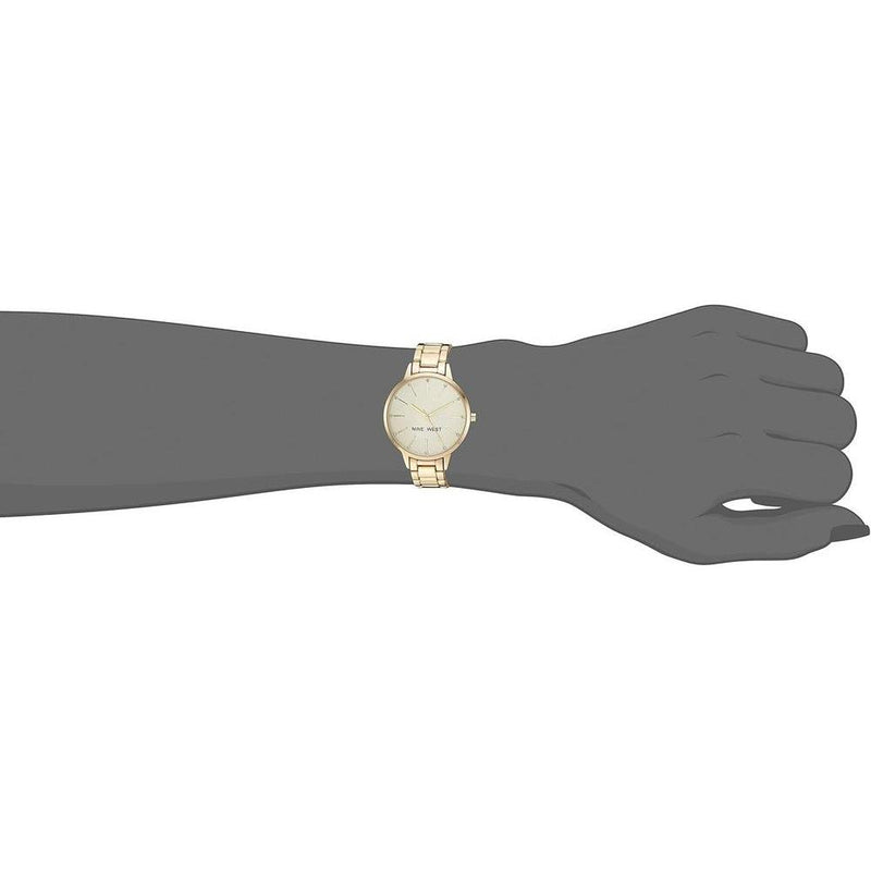 Nine West Reloj de pulsera con detalles de cristal para mujer, resistente al agua, diseño elegante, caja de 3.6 cm, banda de oro de 7 pulgadas.