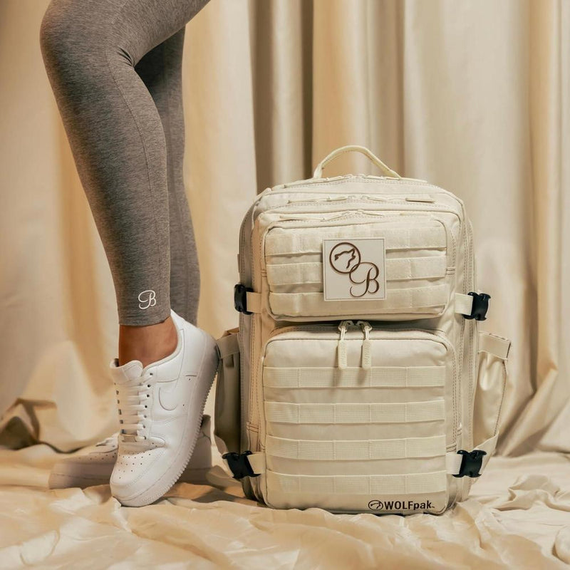 WOLFpak Mochila 35L Bombshell Sportswear en color crème, diseño unisex para actividades casuales y deportivas, hecha de poliéster resistente