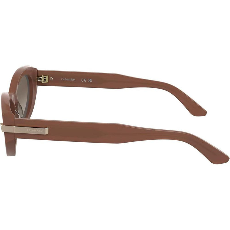 Calvin Klein Gafas de Sol para Mujer con Diseño Sofisticado, Estilo Ojo de Gato, Rosa Opalina con Lente Gradiente