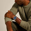 Fossil Everett - Reloj para hombre con correa de acero inoxidable o cuero, resistente al agua y esfera texturizada azul