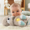 Fisher-Price Baby Sound Machine Soothe 'n Snuggle Otter - Juguete portátil de peluche con detalles sensoriales, luces y movimiento