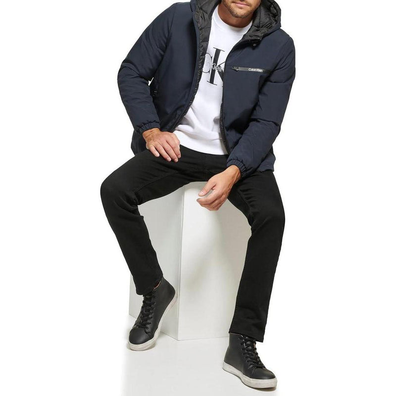 Chaqueta cortavientos de Calvin Klein para hombre con capucha, diseño versátil, resistente al agua y viento, ideal para clima frío