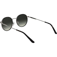 Lentes de sol Calvin Klein CK25101S con diseño redondo y marco de metal, incluyendo almohadillas nasales ajustables para mayor comodidad