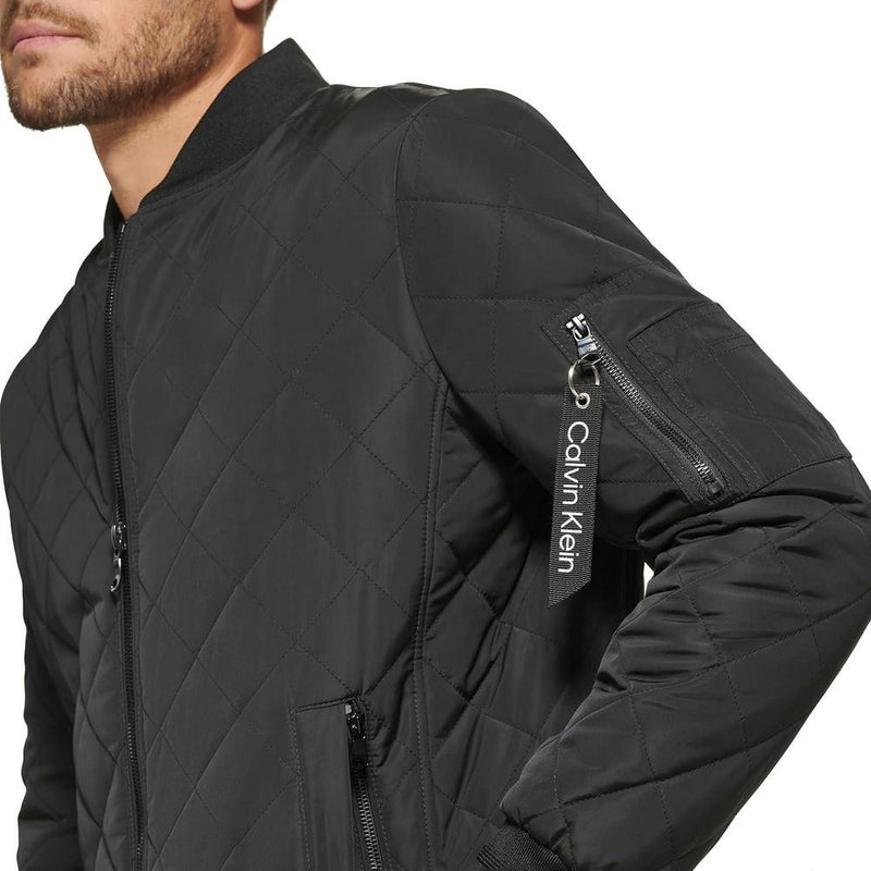 Chamarra de aviador Calvin Klein para hombre con detalle de cremallera acolchada, ideal para clima de transición