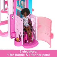 Casa de muñecas Barbie Dreamhouse con tobogán espiral, 75+ accesorios, ascensor para mascotas y zonas de juego