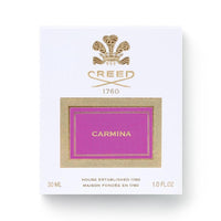 Creed Carmina, un perfume de lujo para mujer que combina fragancias florales y amaderadas, ideal para resaltar elegancia y personalidad