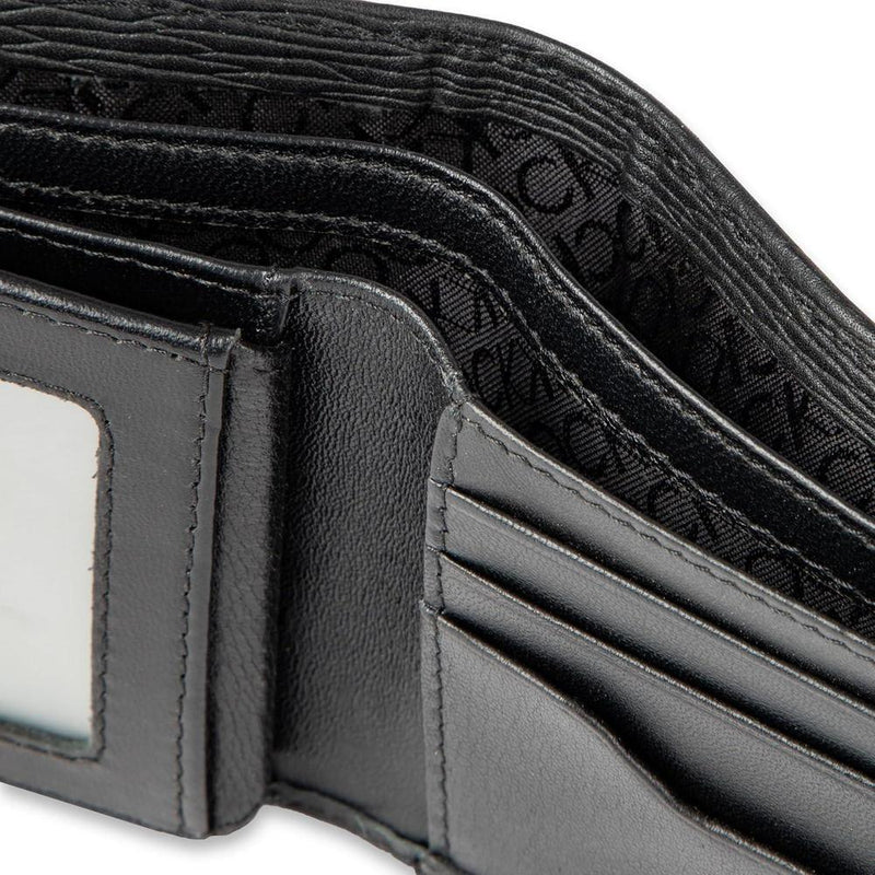 Billetera Calvin Klein de cuero con tecnología RFID, múltiples ranuras para tarjetas y ventana de identificación