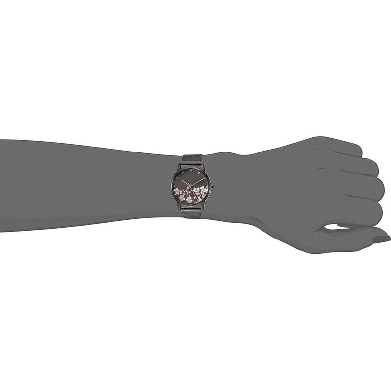 Reloj de pulsera para mujer Nine West con diseño floral, manecillas doradas, pulsera plateada, cristal resistente